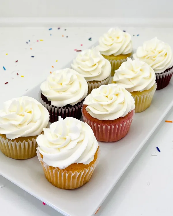 Assorted cupcakes with swirled buttercream rosettes