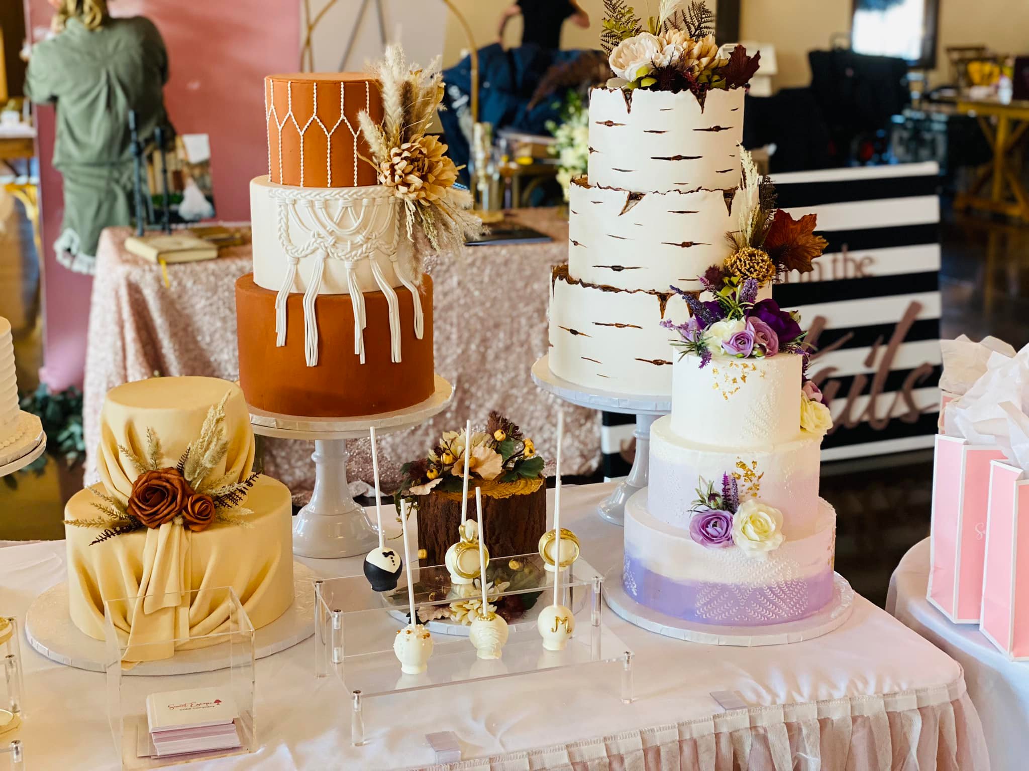 A variety of custom Sweet Escape tiered cakes