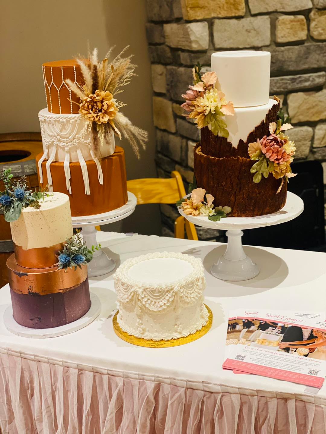 Boho three-tier wedding cake with dried florals